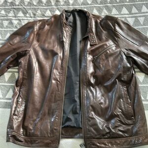 Selling a brown leather Matinique bomber jacket in very good condition.